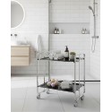 BAUHAUS Folding Cart with chrome frame and black shelves, towels and soaps in a bathroom