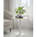 SKANDY white side table beside armchair with books